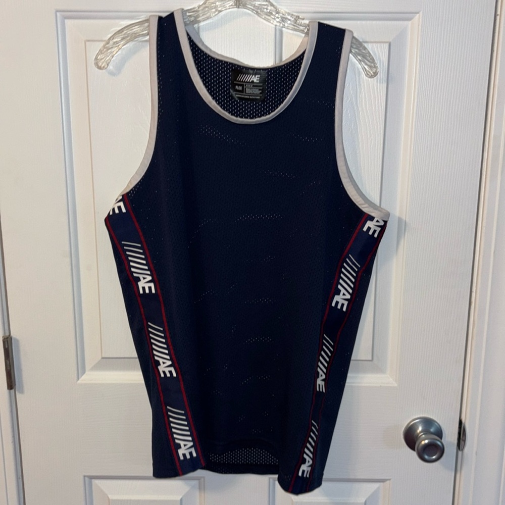 American Eagle men’s basketball jersey style tank top
Navy, white & red Medium